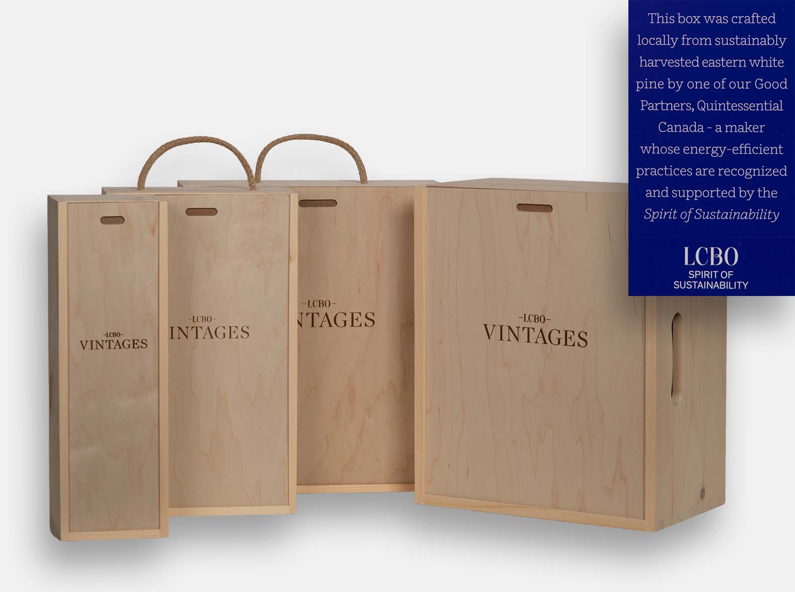 Set of four wooden LCBO Vintages wine gift boxes in different sizes.
